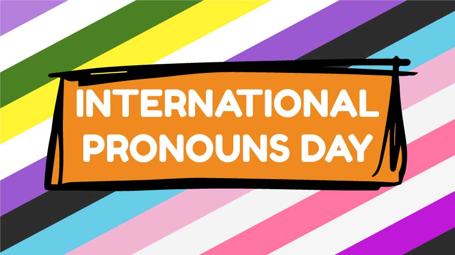 The background has many stripes when are made up of the Non-Binary, Trans, Genderqueer and Gender Fluid Pride Flags and in the centre is a panel with the words International Pronouns Day